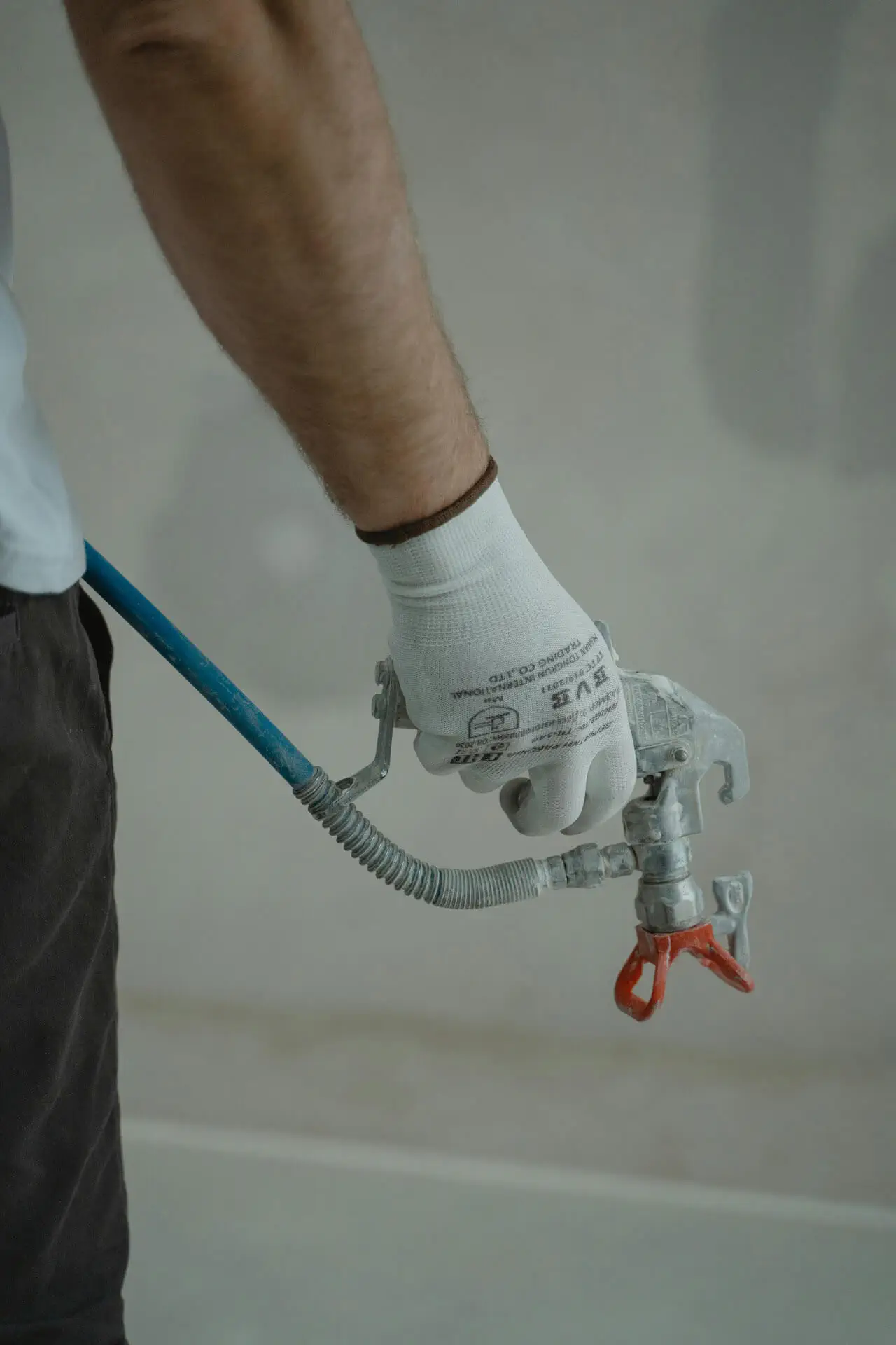 Holding paint spray gun